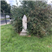 Photo of headstone under an overgrown bush - Youngs Cemetery