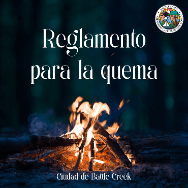 Small bonfire at night, with Spanish text about burning in the city.