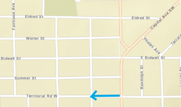 City streets map with teal blue line over Territorial road just west of Capital Avenue SW.